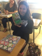 Photo Credit: Kiana East Posing with her favorite Girl Scout cookies, a VHS freshman says she could never live without Thin Mints.